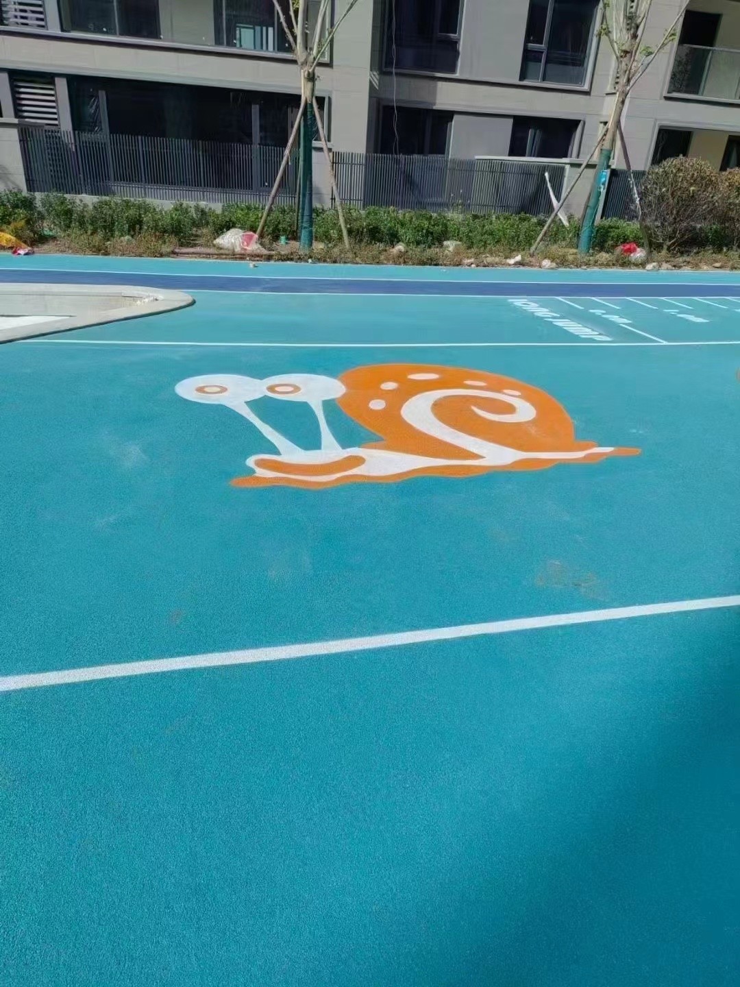 透水路面材料摊铺实景