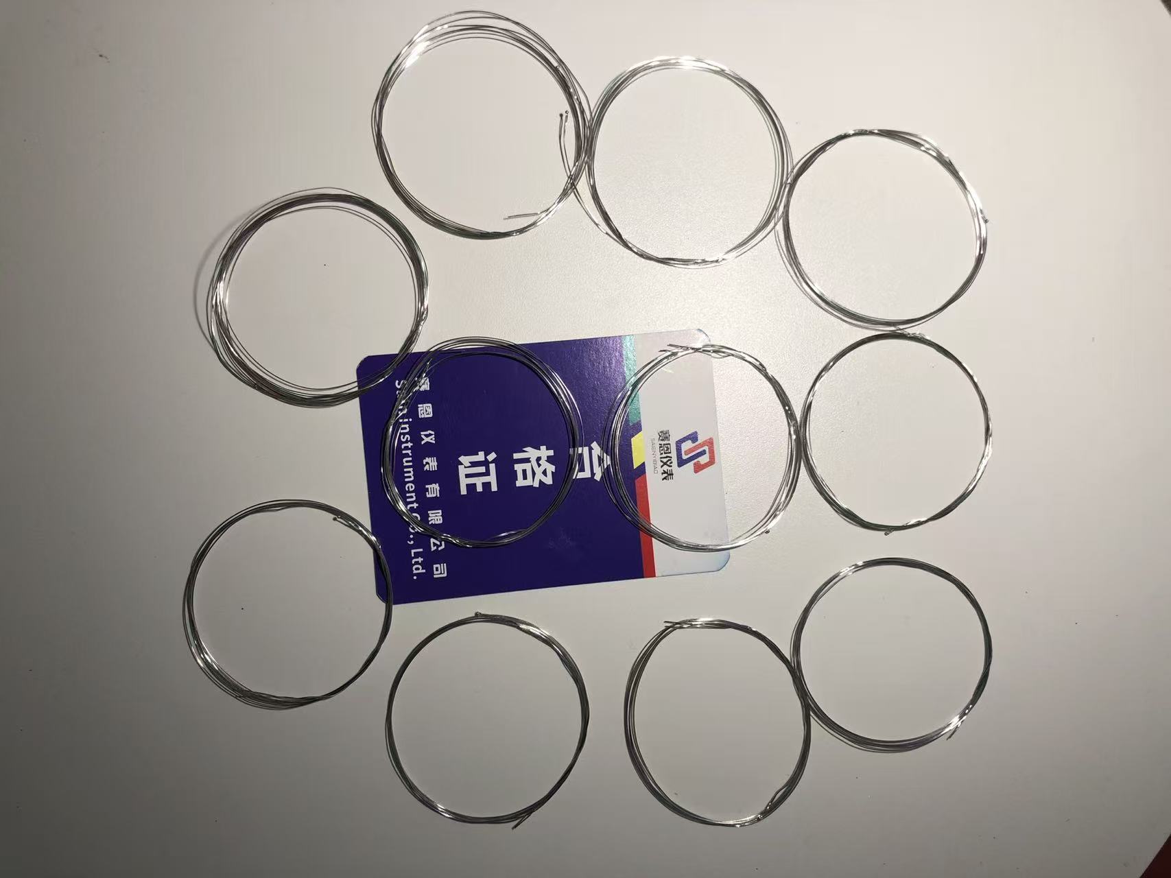 光纤温度传感器实物与结构示意